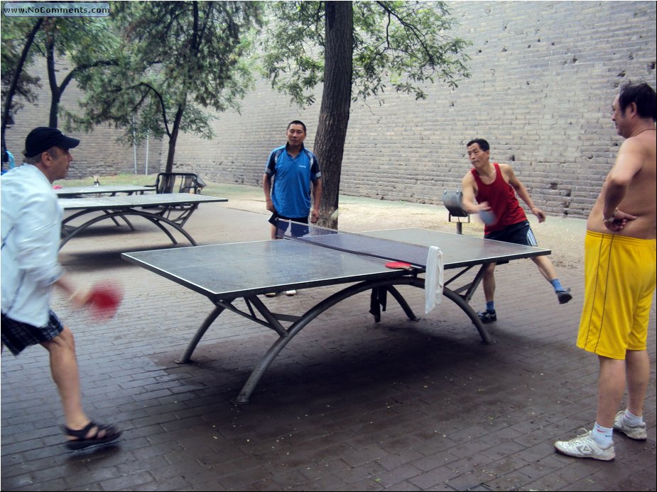 z playing tennis in the park .JPG