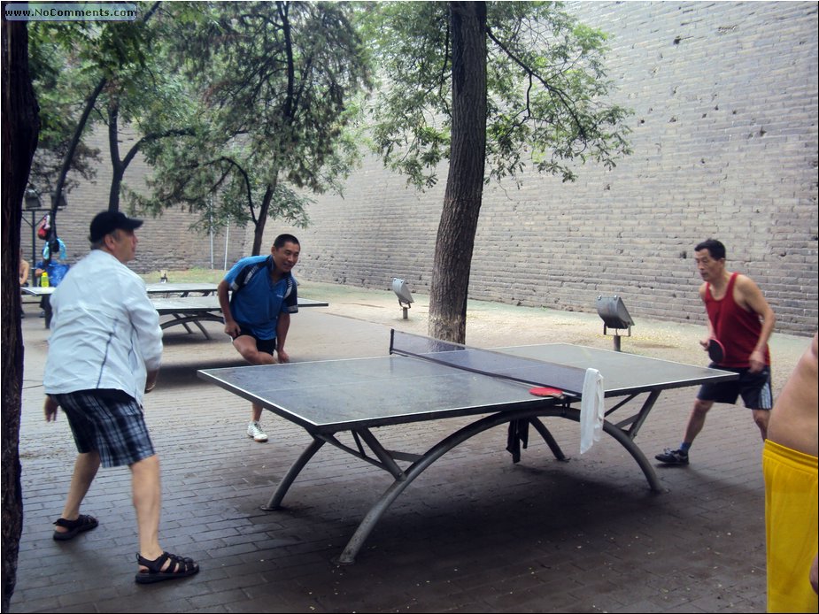 z playing tennis in the park.JPG
