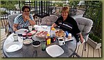 Breakfast at the garden syrniki.jpg