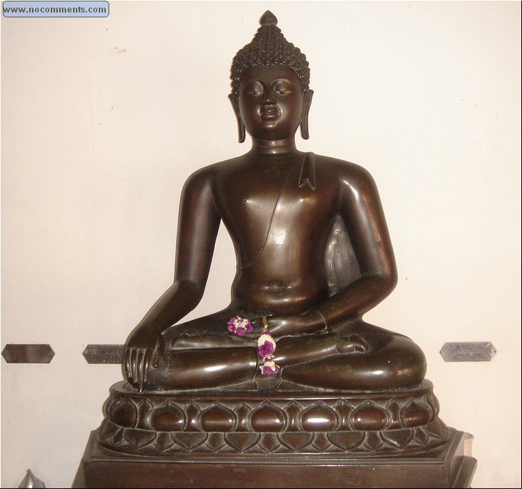 Marble Temple Buddha subduing Mara (Burma).JPG