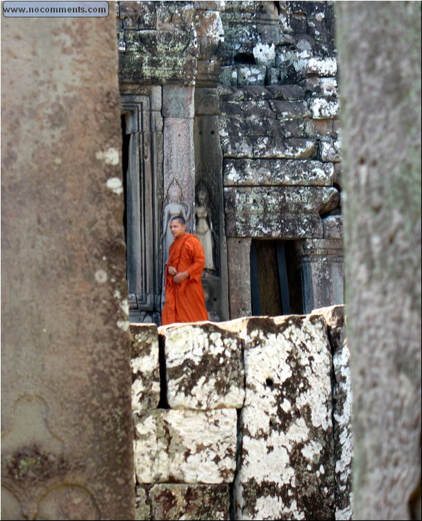 Monk in ruins Cambodia.jpg