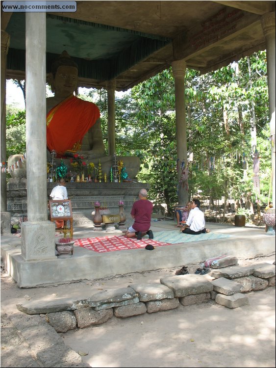 Serge before resident Buddha 1 Cambodia.jpg