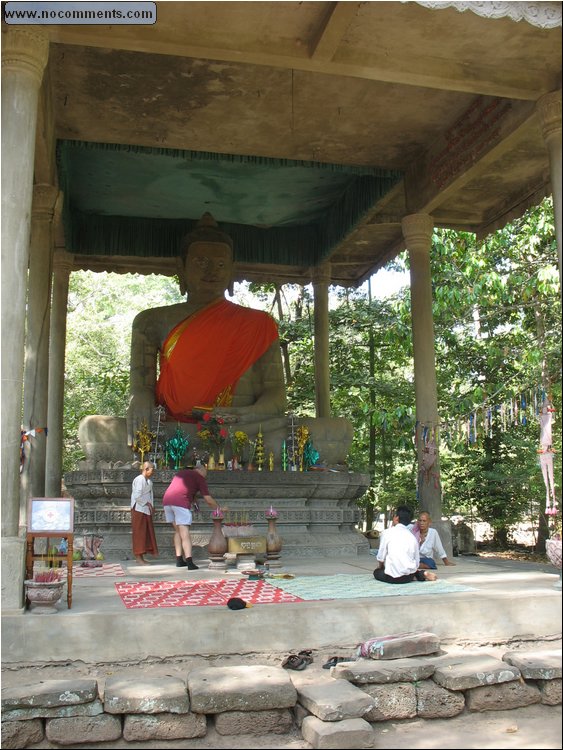 Serge before resident Buddha 2 Cambodia.jpg